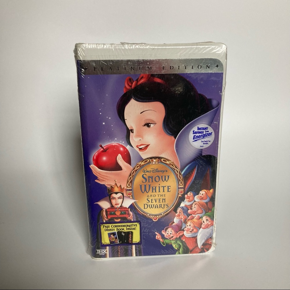 Snow White and the Seven Dwarfs Sealed NEW, Disney Book inside. Platinum edition